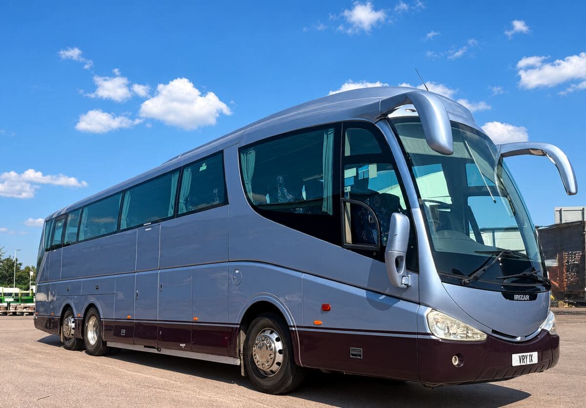 Silver Irizar tri-axle coach from a partner operator