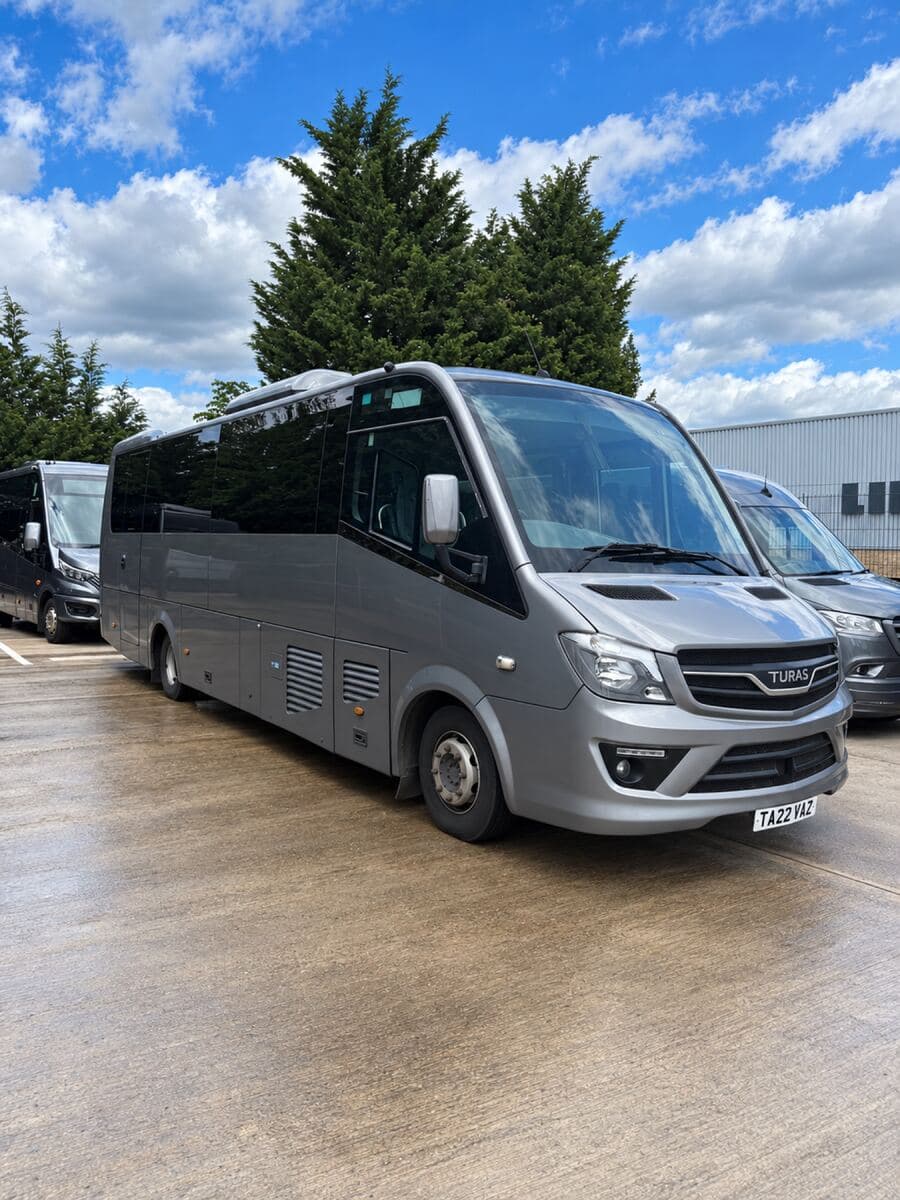 Grey midi coach from a partner operator